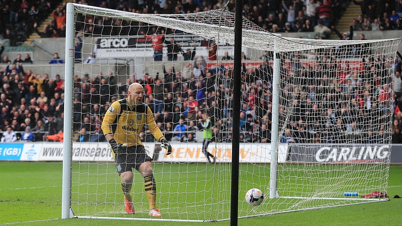 Villa keeper Bradley Guzan looks on helpless as Jonjo Shelvey's wonder strike hits the back of the net