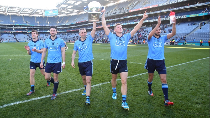 Dublin players with the League trophy after their resounding victory