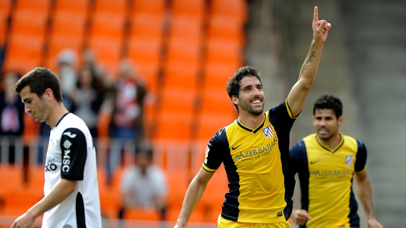 Atletico Madrid's Raul Garcia celebrates his winner against Valencia