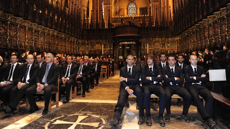 Barcelona players and officials gather during a religious ceremony for the late, former Barcelona coach Tito Vilanova