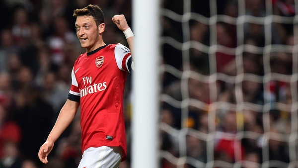 Mesut Ozil faces a long break with a knee ligament injury