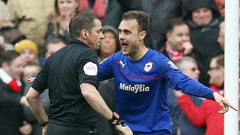 Cardiff Citys Juan Cala argues with referee Phil Dowd after receiving a red card