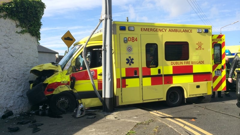 The ambulance collided with a car and then hit a wall