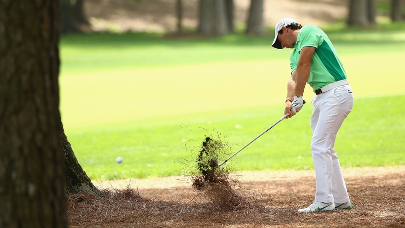 Rory McIlroy hits a shot on the third hole during the second round