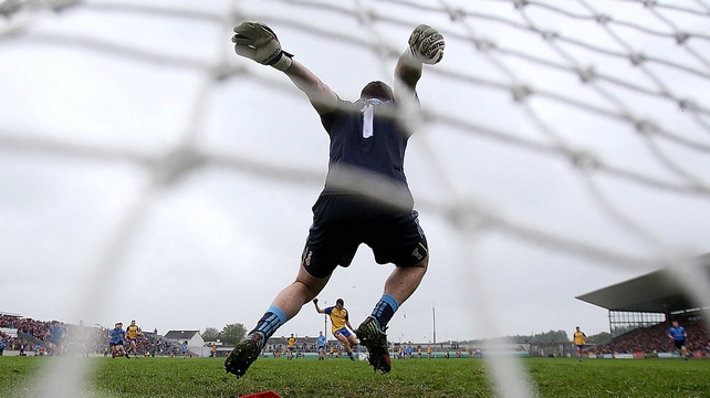 Dublin under-21 goalkeeper Lorcan Molloy saves a penalty from Donie Smith of Roscommon