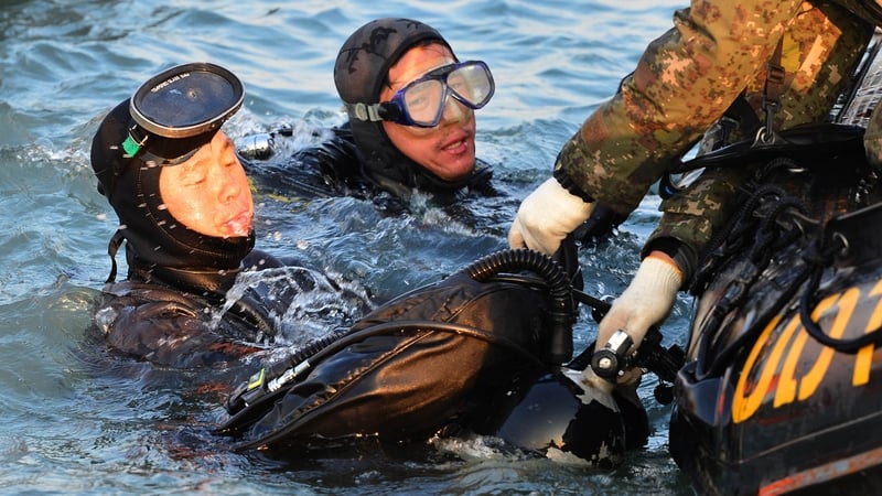 Dive teams have been working in challenging conditions as they search the wreckage