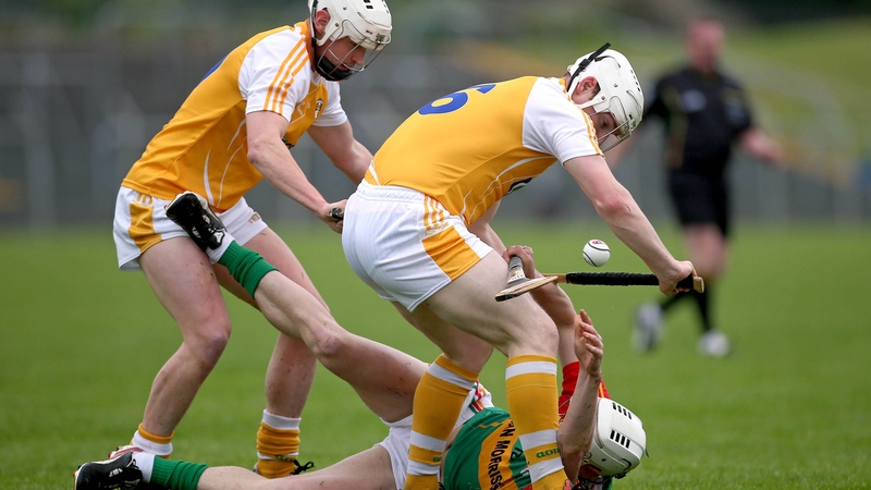 Carlow's James Doyle with Neal McAuley and Aaron Graffin of Antrim during the round two qualifier