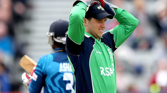 Ireland wicketkeeper Gary Wilson reacts to a missed chance