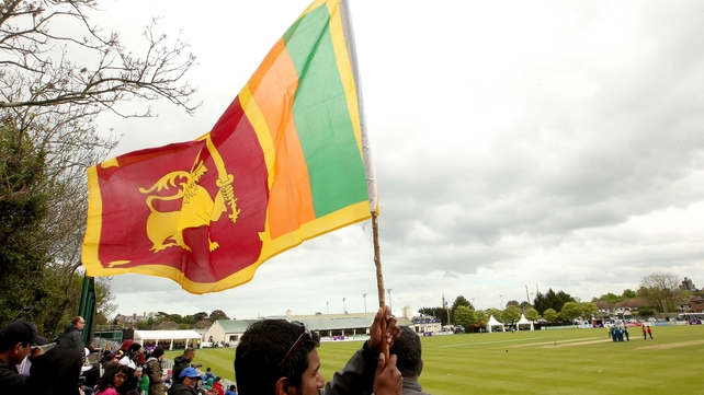 A Sri Lanka fan waves his flag