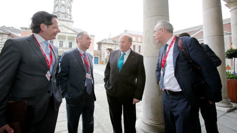 John Moran (left) pictured with Department of Finance officials and Finance Minister Michael Noonan