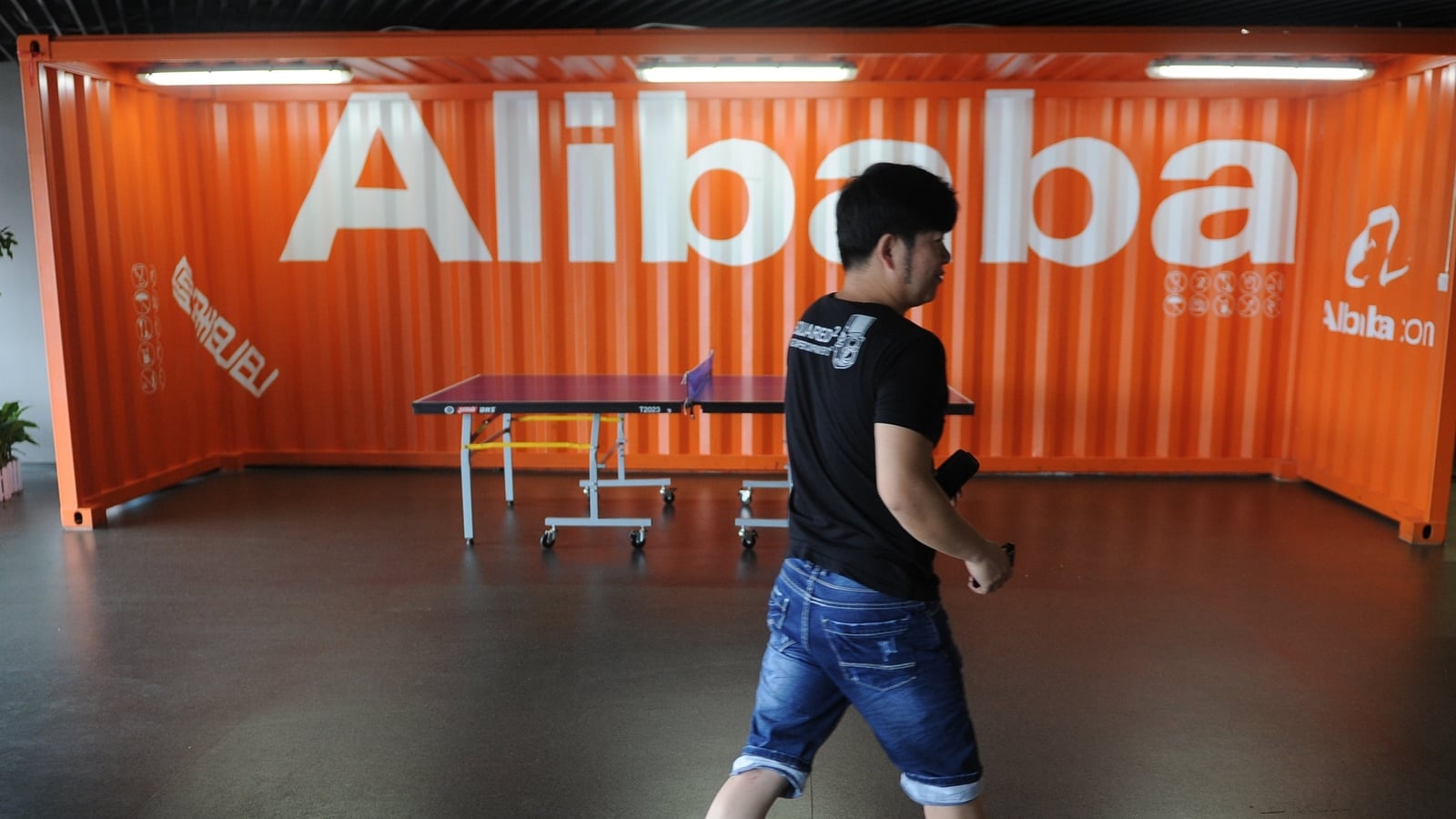 Chinese giant Alibaba posts profit drop amid AI drive