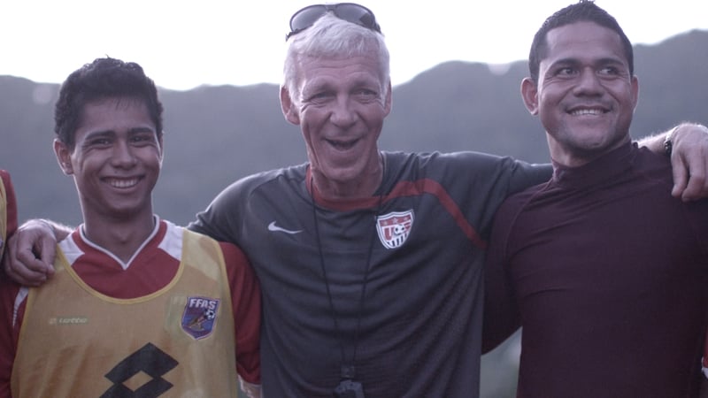 Dutch coach Thomas Rongen (middle) with members of the American Samoa squad