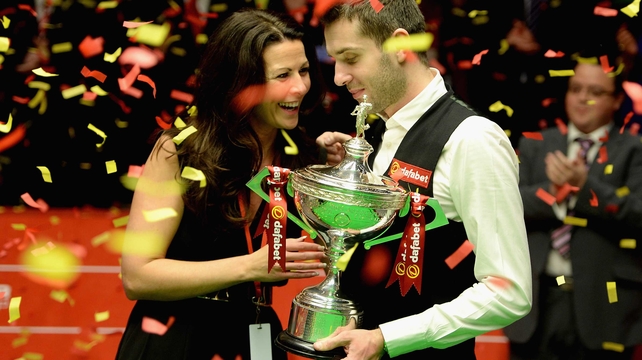 Mark Selby celebrates winning the World Snooker Championship title with his wife