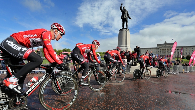 Team USA pass the statue of Edward Carson as they enter the Stormont estate during a practice session on Friday