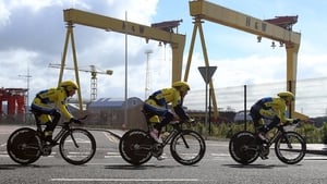 Members of the Tinkoff-Saxo team pass the iconic Harland and Wolff cranes in Belfast