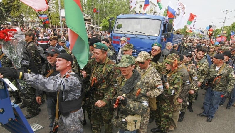 Armed supporters of the self-declared Donetsk People's Republic depart for Mariupol to help to separatists fighting with Ukrainian National Guard forces