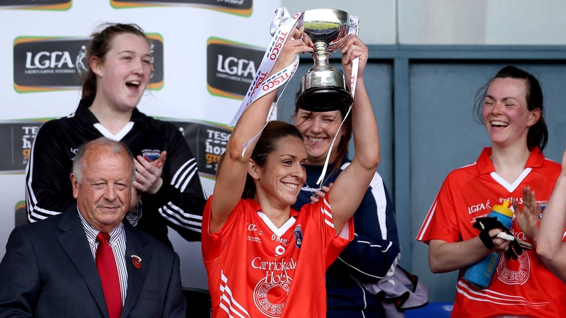 Caitlin Malone lifts the trophy after Armagh won the Ladies NFL Division 3 title