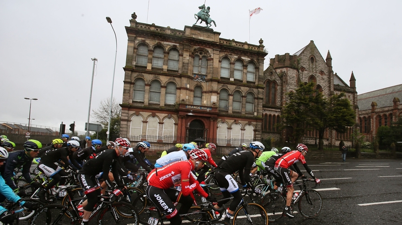 The peloton makes its way past an Orange Hall on Clifton Street early on stage two of the 2014 Giro d'Italia in Belfast