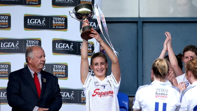 Galway's Sinead Burke lifts the Ladies Division 2 trophy after victory over Westmeath