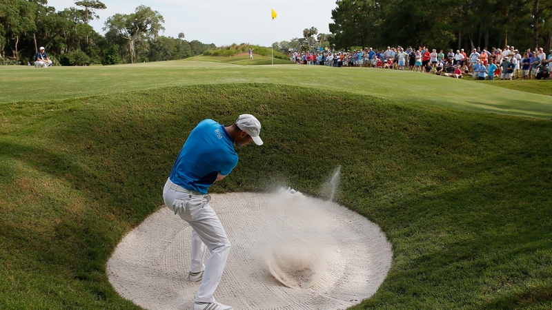 Martin Kaymer hits a bunker shot on the 12th during the third round