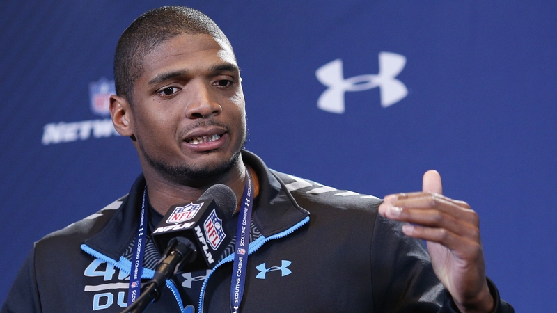 Michael Sam speaks to the media during the 2014 NFL Combine