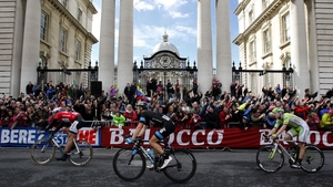 Giant-Shimano's Marcel Kittel (left) passes Government Buildings on Merrion Street after crossing the finish line to win stage three of the 2014 Giro d'Italia on Sunday