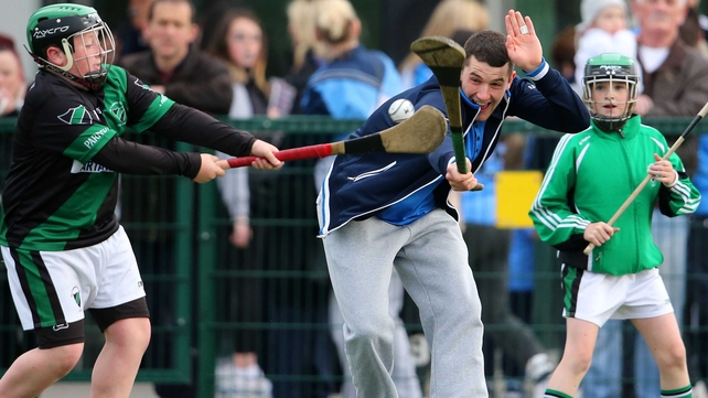 Hurler Eamon Dillon gets a block in during Dublin GAA's open night in Parnell's