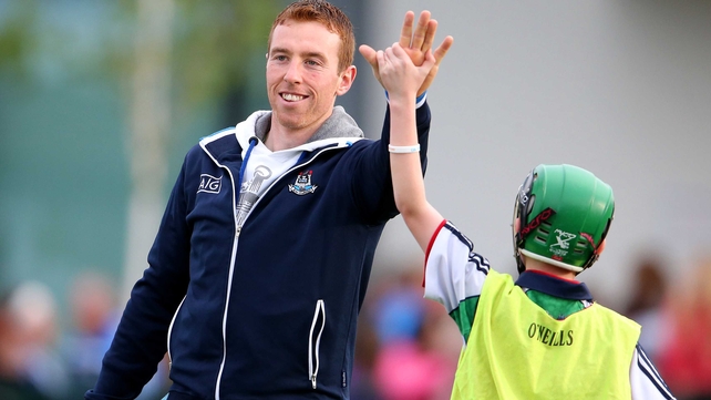 John McCaffrey high fives a young fan at Dublin GAA's open night