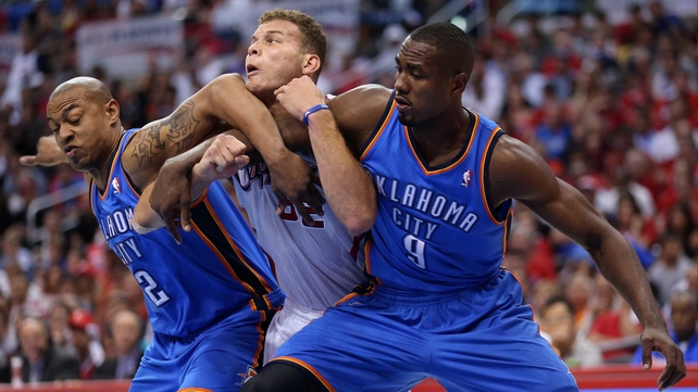 You shall not pass - Blake Griffin of the Los Angeles Clippers is strong-armed by Oklahoma City Thunder's Serge Ibaka and Caron Butler