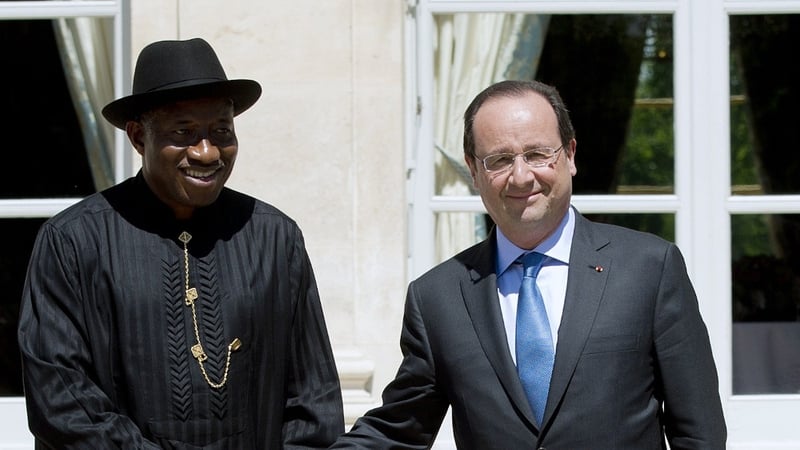 Francois Hollande pictured with Nigerian president Goodluck Jonathan ahead of a summit in Paris