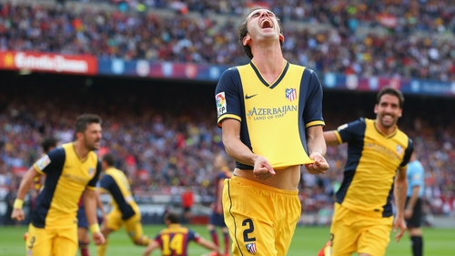 Diego Godin celebrates Atletico Madrid's equaliser at the Camp Nou, which sealed the La Liga title for the Atléti