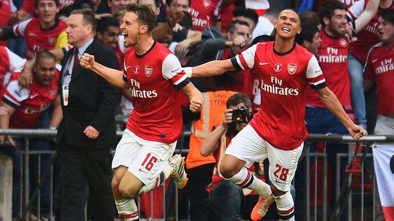 Aaron Ramsey celebrates after scoring the extra-time winner for Arsenal
