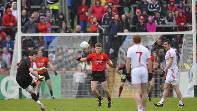 Down goalkeeper Brendan McVeigh takes a free against Tyrone