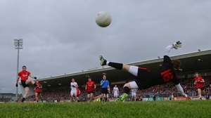 Aidan Carr scores a penalty for Down