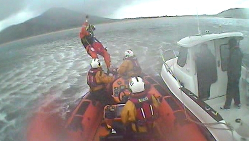 A paramedic was winched onto the lifeboat to assess the fisherman's condition (Pic: Lough Swilly RNLI)
