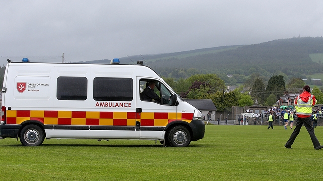 An ambulance comes onto the field in Aughrim after a spectator is taken ill