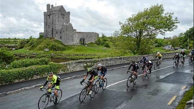 Stage 2: The peloton rides past Dunguaire Castle