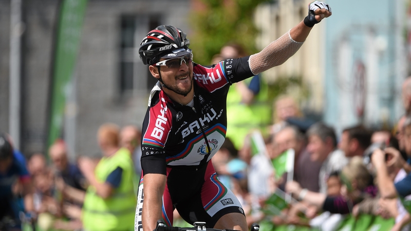 Jan Sokol punches the air as he crosses the finish line in Charleville