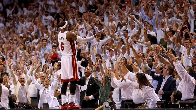 LeBron James of the Miami Heat reacts to winning an Eastern Conference semi-final of the NBA play-offs against the Brooklyn Nets in Miami, Florida