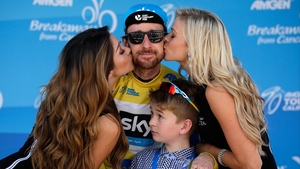 Bradley Wiggins is happier about a kiss from the flower girls than his son Ben at the 2014 Amgen Tour of California