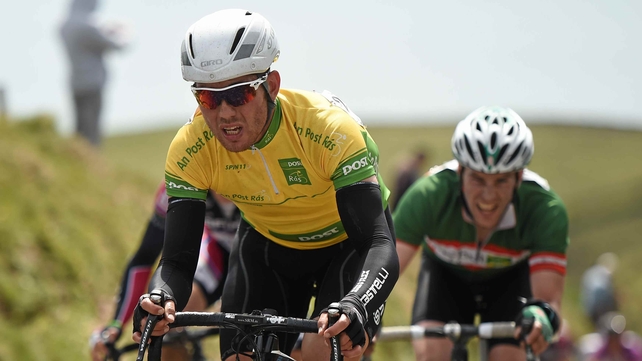 Race leader Patrick Bevin, New Zealand National Team, reaches the peak of the Coomanaspic climb
