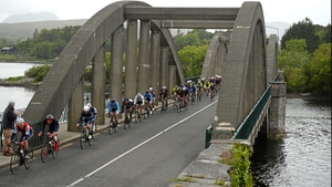 Stage 5: The peloton rides over Kenmare Bridge