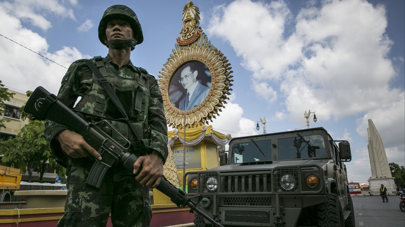 A Thai soldier stands guard in Bangkok in the aftermath of the military seizing power
