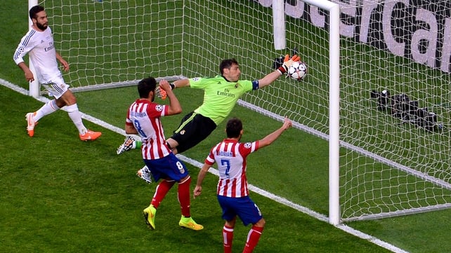 Atletico Madrid's Diego Godin is on hand to punish some lax goalkeeping from Iker Casillas to give the Mattress Men a first-half lead