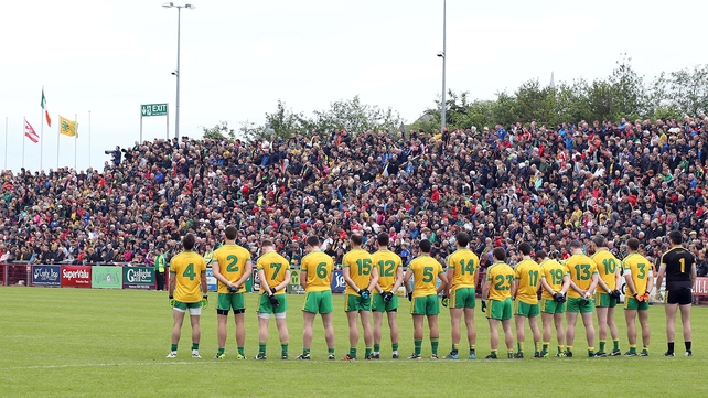 Donegal players line up for the national anthem before their tie with Derry
