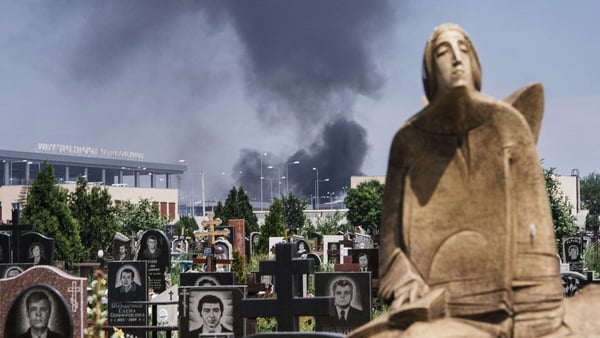 Smoke billows from the airport in Donetsk