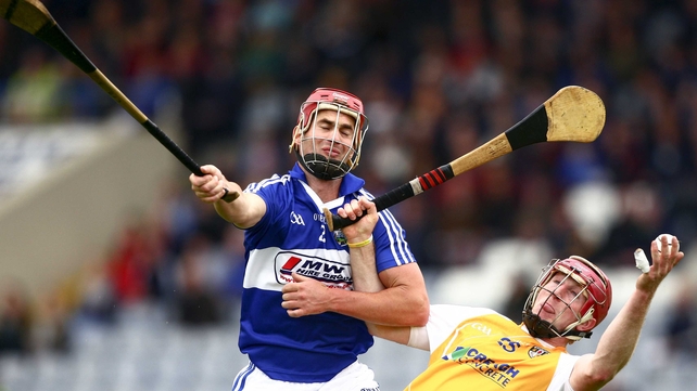 Antrim's PJ O'Connell with John A Delaney of Laois during the side's round-robin clash in Portlaoise