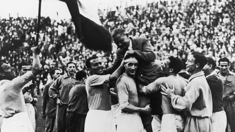 The Italian World Cup squad carry their manager, Vittorio Pozzo shoulder high
