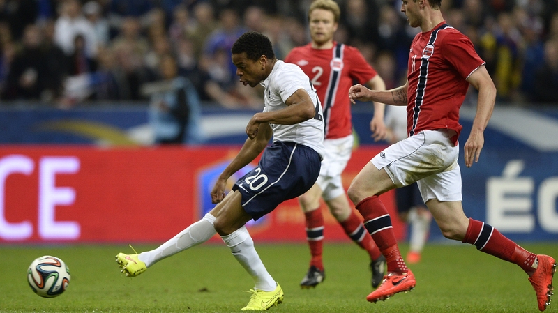 Loic Remy slots home France's third goal against Norway