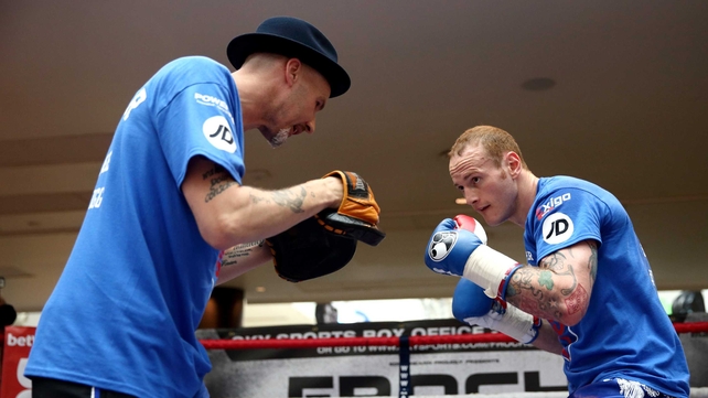 George Groves (R) works out with his trainer Barry Fitzpatrick ahead of his fight against Carl Froch